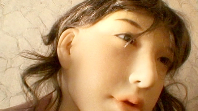 リアルフェイス全身タイツの女